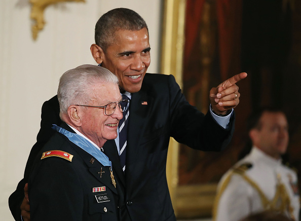 WASHINGTON, DC - JULY 18: U.S. President Barack Obama stands with retired Army Lt. Col. Charles Kettles, after presenting him with the Medal Of Honor during a ceremony in the East Room at the White House July 18, 2016 in Washington, DC. Kettles who was a UH-1D Huey helicopter pilot during the Vietnam War displayed extraordinary heroism, and is credited with saving the lives of 40 soldiers and four of his own crew members. (Photo by Mark Wilson/Getty Images)