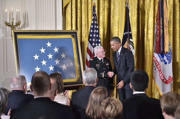 US President Barack Obama shakes hands with retired US Army Lt. Colonel Charles Kettles after presenting him with the Medal of Homor during a ceremony in the East Room of the White House on July 18, 2016 in Washington, DC. Lt. Colonel Kettles was awarded the Medal of Honor for conspicuous gallantry while serving in Vietnam. / AFP / MANDEL NGAN (Photo credit should read MANDEL NGAN/AFP/Getty Images)