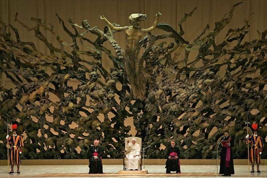 Pope Benedict XVI waves to faithful during weekly audience at Vatican