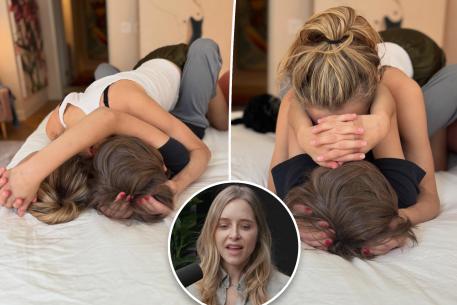 Jenny Mollen holding her son Sid in bed