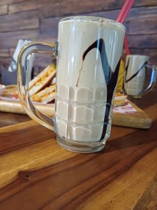 Cold coffee drink with a straw