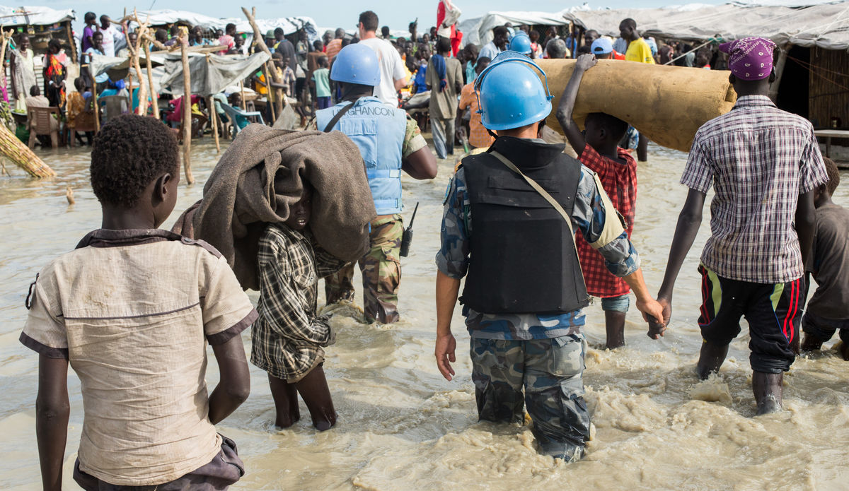 UN Photo/UNMISS/JC Mcilwaine Displaced people living in flooded protection site.