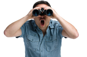 man-looking-through-binoculars