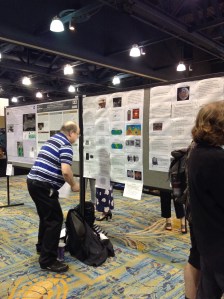 John Brandenburg Setting Up His Poster at LPSC in 2015