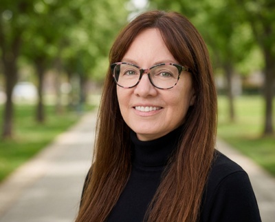 Professional AI headshot example created by HeadshotPro - female business portrait
