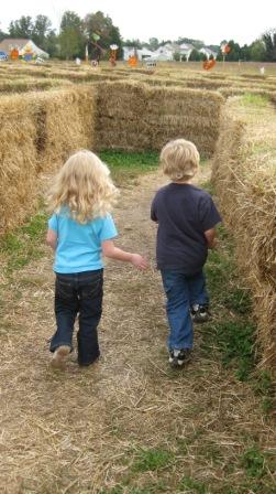 100808-005 My twins taking on a hay maze.