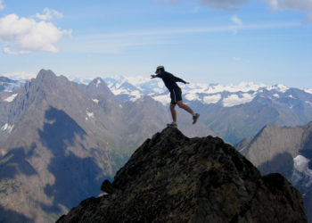 mountain climber at peak