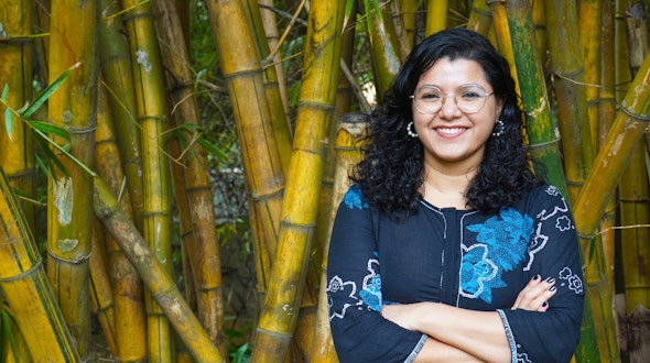 Portrait of Abhilasha Joshi taken in the gardens at the National Centre for Biological Sciences, Bengaluru, India.