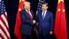 图为习近平(右)及特朗普(左)握手 图为习近平(右)及特朗普(左)握手