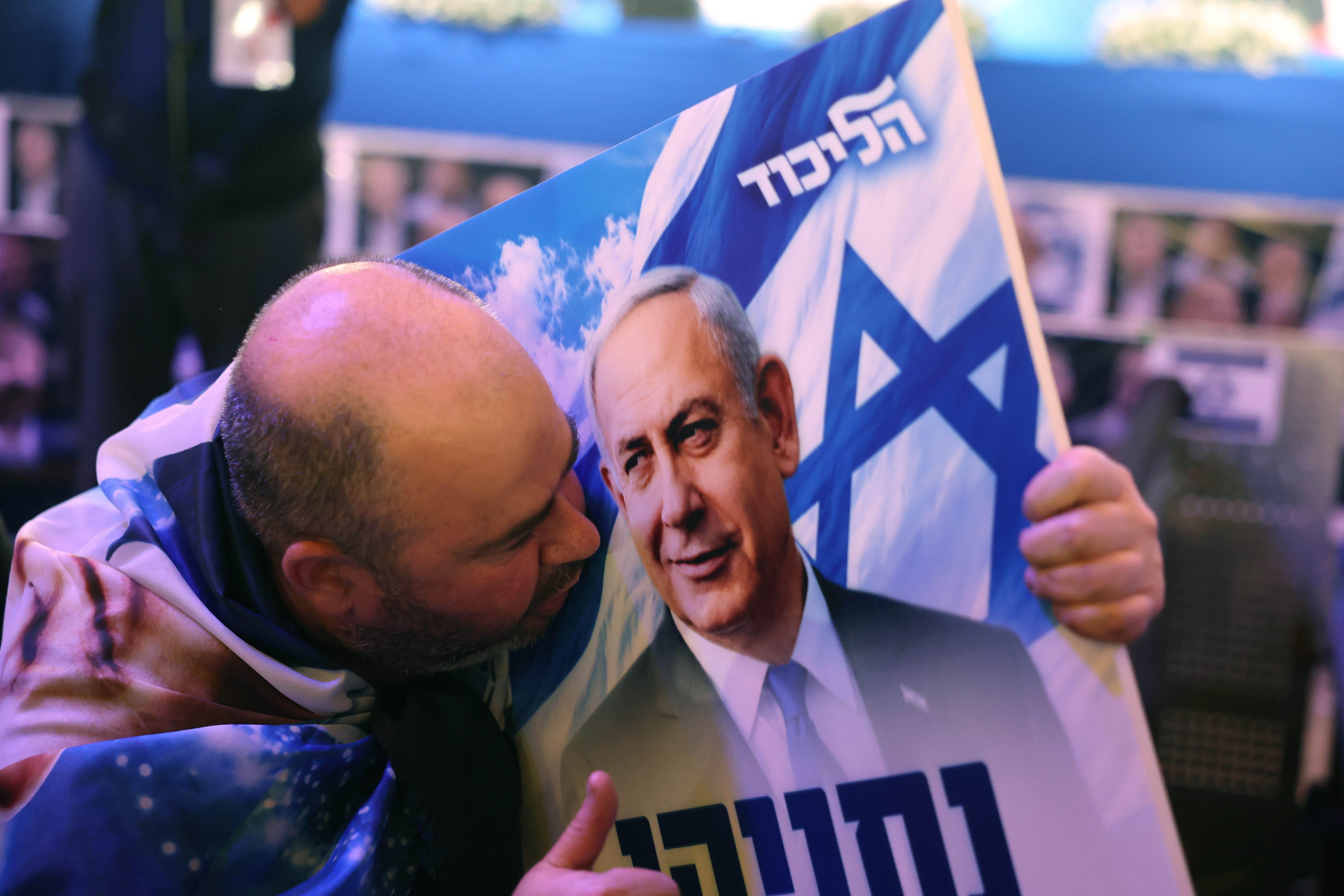 A supporter of Israeli prime minister Benjamin Netanyahu reacts to the first exit polls at a Likud party election event in Jerusalem on 27 October 2026