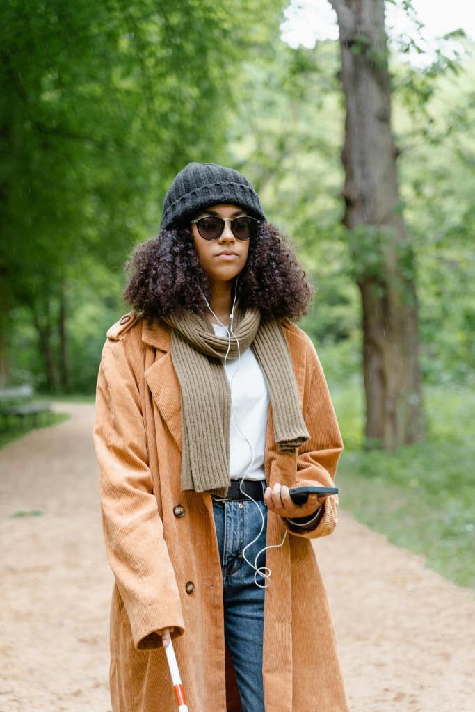Walking with a white cane in the forest
