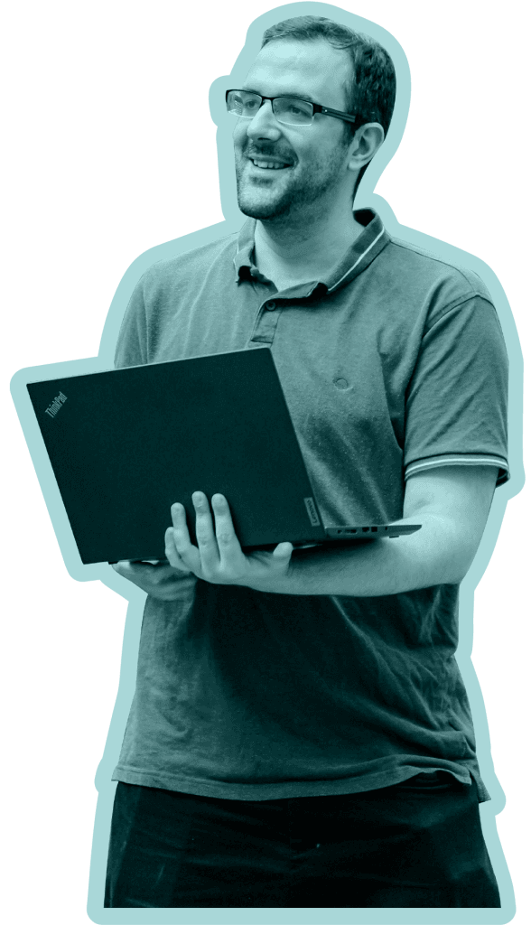 A T5 Digital developer standing with this laptop.
