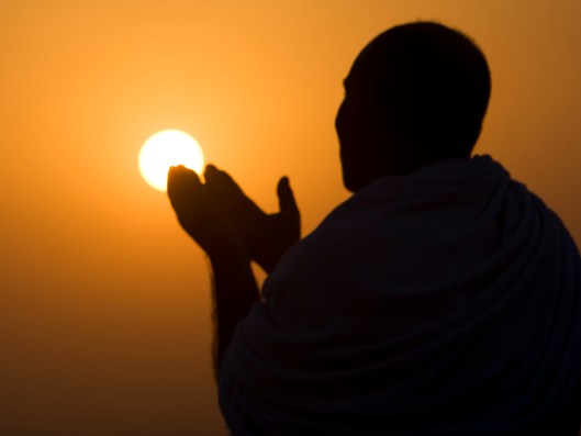 A Muslim pilgrim prays at the top of Mount Noor in Mecca, during the annual pilgrimage (Haj) December 4, 2008. The pilgrims will visit the Hera cave in Mount Noor, where Muslims believe Prophet Mohammad received the first words of the Koran through Gabriel. REUTERS/Ahmed Jadallah (SAUDI ARABIA)