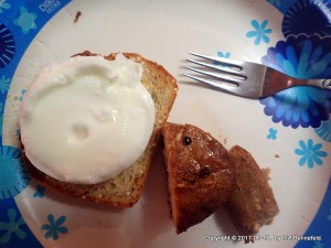 poached egg with pan-fried tuna steak and a slice of millet-and-chia seed g-f bread