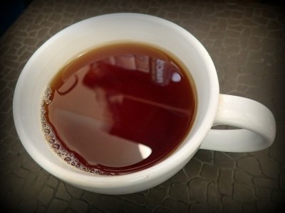 cup of black tea on a table