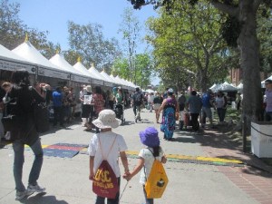 We scoped out the scene and the kids took the lead. They scouted for the children book tents and found them right away.