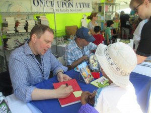 After all the Batman action and dancing, we raced back to the children's area to see if we could still catch the person responsible for one of my son's favorite series...Captain Underpants. It was the longest line ever, but it was worth the wait as Dav Pilkey signed and created a sketch in his book.