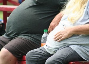 "Honey, could you walk over & get me another pack of those sugar free cookies? I've almost finished the fat free treats - don't you just love this diet?"