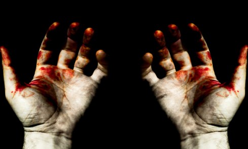 Hands in blood