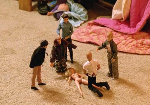 Martin Hart's daughter placed five male dolls around a female naked doll.