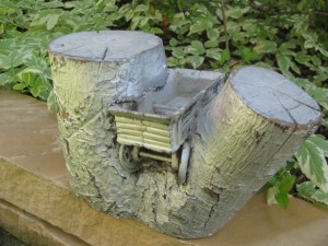 The little metal wagon left in the tree branch. (full story in the July 26 post, "A Mistake?")