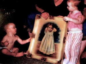 2005 ~ Molly holds portrait of Dad's mother as a toddler for her own toddlers, Mary's great-grandchildren.
