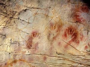 stenciled cave hand