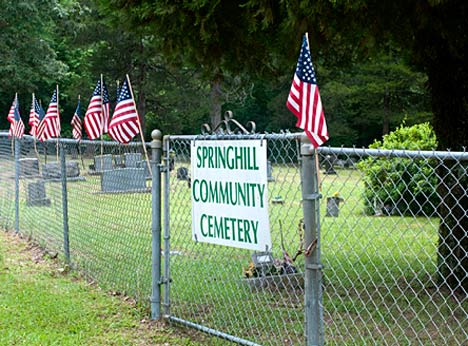 JOE_2304 Remembrance and respect knows no geographic limitations. Spring Hill Community Cemetery can be found only after a trip on a gravel road. That does not diminish the sacrifices here represented.