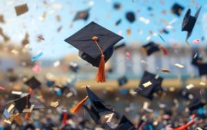 Mortarboards thrown into the air during a graduation ceremony