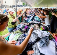 TMC-L-GreatSouthSideSale-01 People look for clothing Saturday, June 6, 2026, during the Great South Side Sale at Broughal Middle School in Bethlehem. The annual community event in South Bethlehem sells gently used items collected from Lehigh University’s move-out drive, at thrift prices. All proceeds directly benefit children’s programming. Over eight 24-foot trucks, two cargo vans and numerous cars were used to deliver the donated goods to be sold. (April Gamiz/The Morning Call)