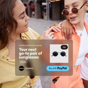 Friends stroll and chat, with images showcasing how they used PayPal to buy items and send money to each other.