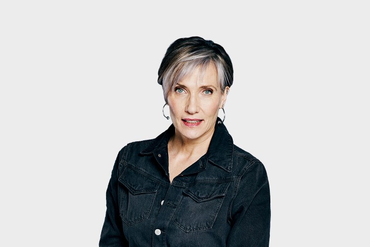 Headshot of Tanya Byron wearing a black denim jacket.