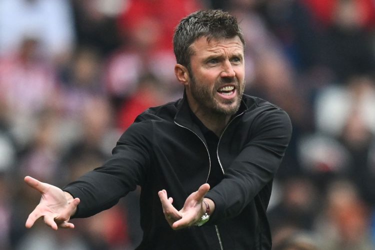 Michael Carrick, manager of Middlesbrough, gestures during a football match.
