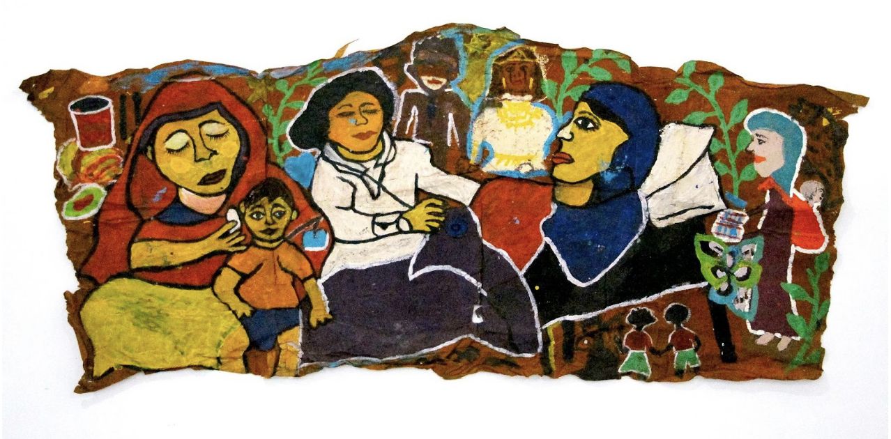 Two women harvesting seaweed