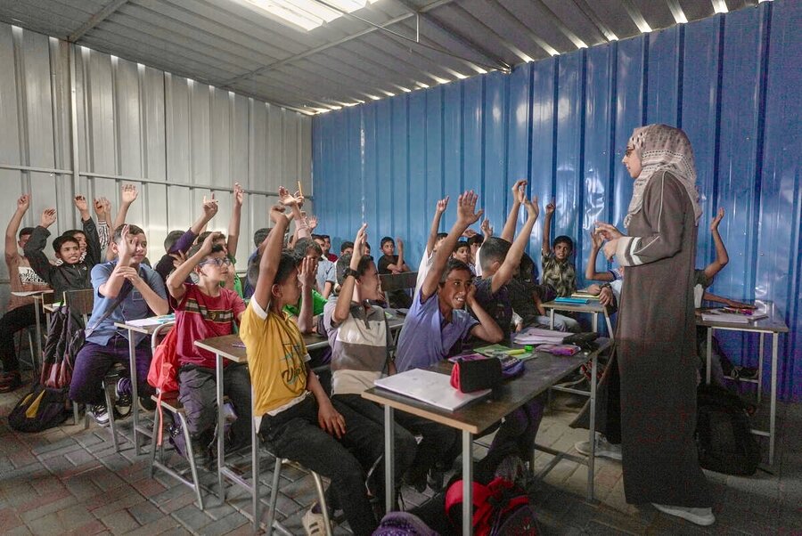 Gaza children in class after a meal.