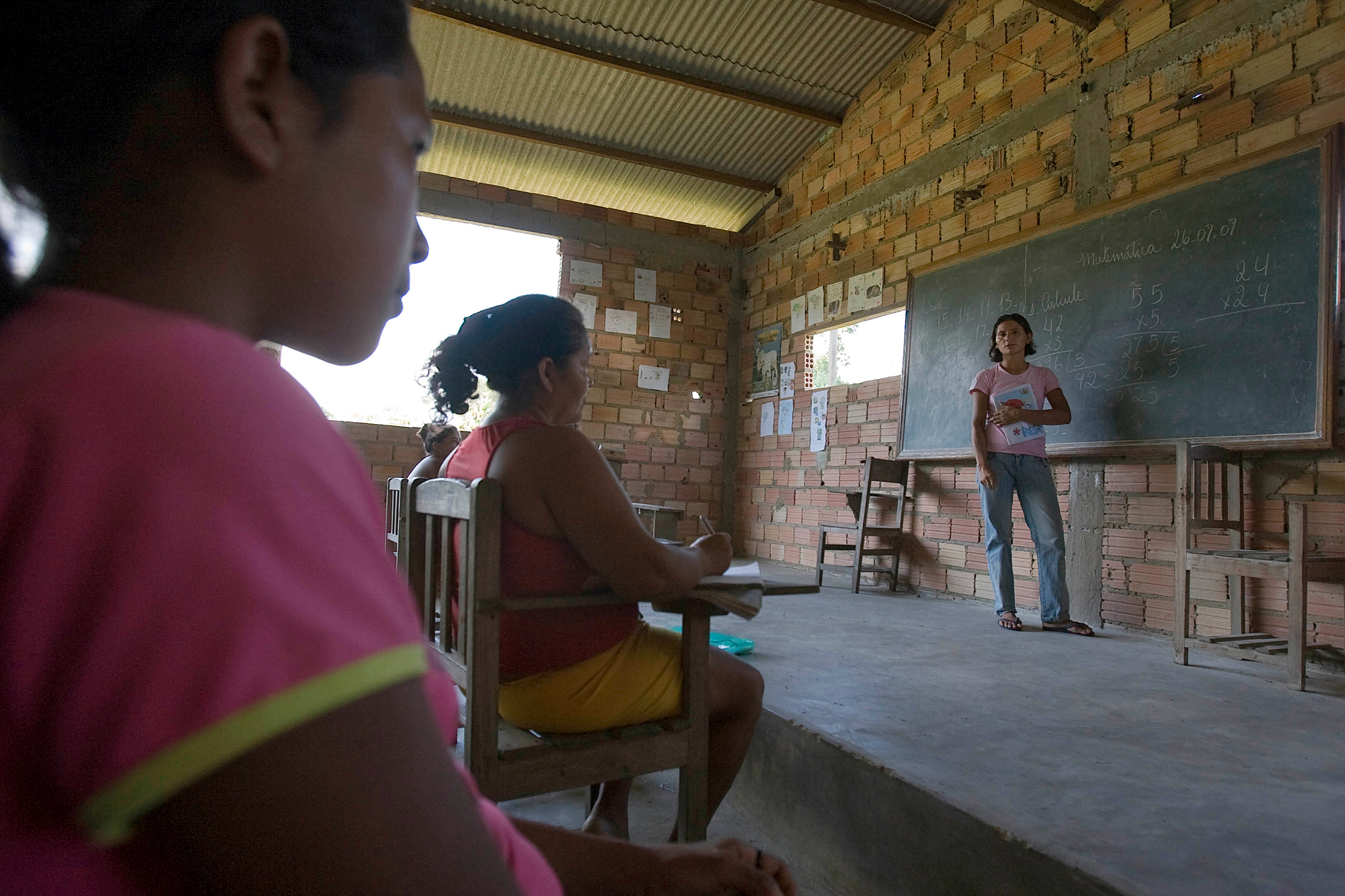 Women receiving basic education at a community school.