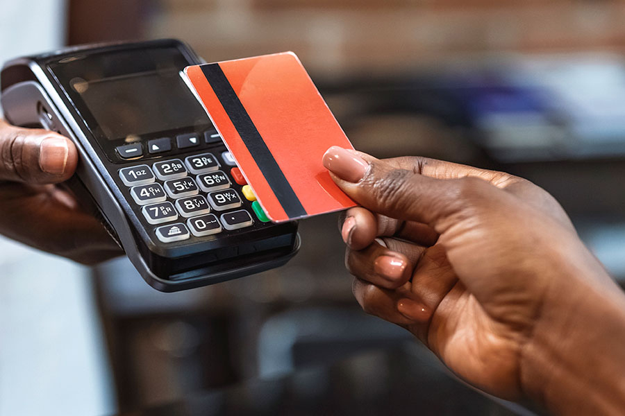 woman paying with card