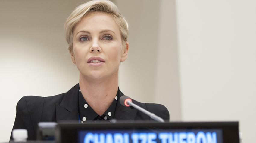 UN Messenger of Peace Addresses High-Level UNAIDS Event Charlize Theron addresses a High-Level UNAIDS event - close up and name plate visible