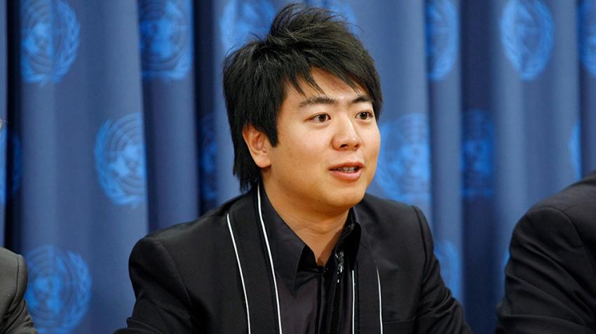Lang Lang Lang Lang addresses a press conference on the event.