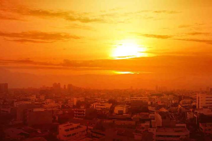 A cityscape at sunset.