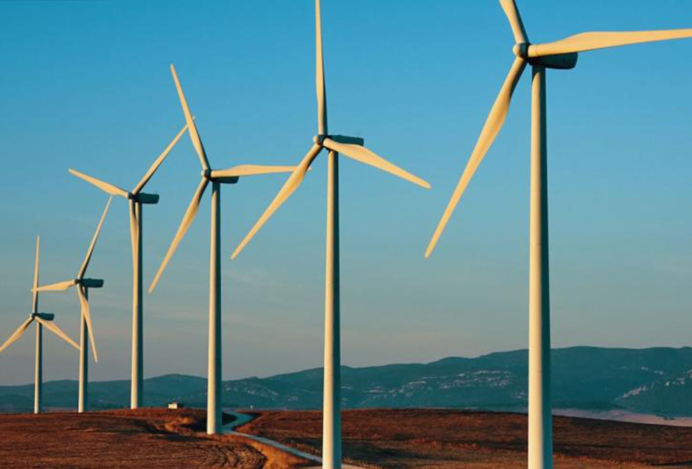A photograph windmills on a ridge