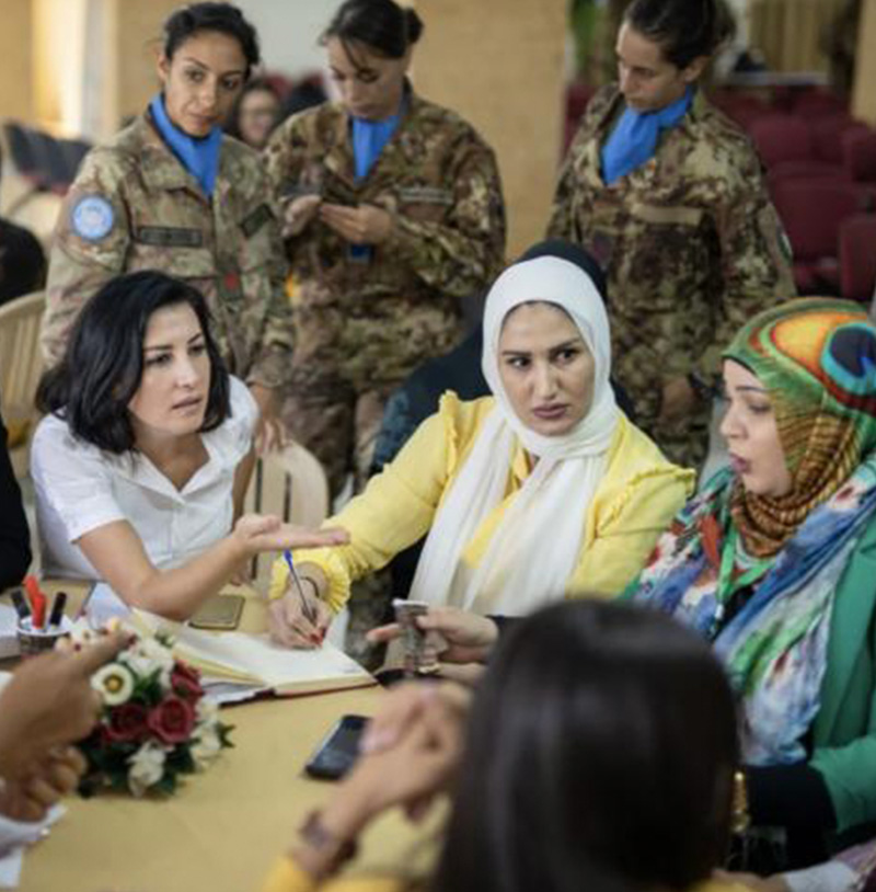 A photo of women conducting intense negotiations